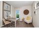 Inviting office space featuring a neutral color palette, desk, chair, and natural light from a window at 37206 Sagemoor Dr, Zephyrhills, FL 33541
