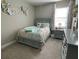 Charming bedroom with one bed, neutral walls, carpet, and decor at 3895 Tate Ct, North Port, FL 34288