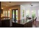 Stylish kitchen with granite countertops, stainless steel appliances, and a breakfast nook at 4313 W Vasconia St, Tampa, FL 33629