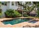 A pristine private pool sits in the backyard of this house at 4313 W Vasconia St, Tampa, FL 33629