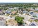Overhead view of a home on a quiet cul-de-sac surrounded by mature trees at 4514 Arizona Sun Ct, Valrico, FL 33594