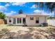 View of the backyard showing the exterior of the home at 4514 Arizona Sun Ct, Valrico, FL 33594
