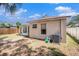 Exterior backyard view of the home showing lanai and fencing at 4514 Arizona Sun Ct, Valrico, FL 33594