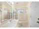Bathroom with shower and tub combo, vanity, and neutral colors at 4514 Arizona Sun Ct, Valrico, FL 33594