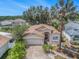 Inviting single-story home with well-manicured landscaping, mature palm trees, and a two-car garage at 4514 Arizona Sun Ct, Valrico, FL 33594