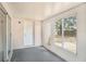 Screened lanai with concrete flooring and outdoor access at 4514 Arizona Sun Ct, Valrico, FL 33594