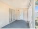 Enclosed lanai with sliding doors and windows, offering a versatile living space at 4514 Arizona Sun Ct, Valrico, FL 33594