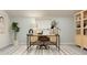 Well-lit home office with modern desk, comfortable chair, and ample storage at 4752 Southern Valley Loop, Brooksville, FL 34601