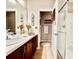 Bright bathroom featuring a vanity with lots of counterspace and a shower with a glass door at 5103 98Th E Ave, Parrish, FL 34219