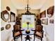 Cozy dining area with unique decor, a charming table setting, and lots of personal style at 5103 98Th E Ave, Parrish, FL 34219