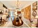 Formal dining room showcasing a chandelier, wood table, and decor for elegant entertaining at 5103 98Th E Ave, Parrish, FL 34219