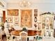 Elegant dining room featuring a decorative chandelier, wooden table and chairs, perfect for gatherings at 5103 98Th E Ave, Parrish, FL 34219