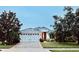 Well-maintained home with a lush front yard and a two-car garage at 5103 98Th E Ave, Parrish, FL 34219
