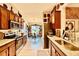 Modern kitchen featuring stainless steel appliances, granite countertops, and abundant cabinet space at 5103 98Th E Ave, Parrish, FL 34219