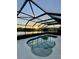 Enclosed Pool overlooking a lake with a sunrise view at 5103 98Th E Ave, Parrish, FL 34219