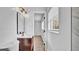 Well-lit bathroom with a stylish vanity and mirror, complemented by natural light, offering a serene space at 603 Amana Ave, Brandon, FL 33510