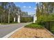 Entrance to a community featuring attractive signage, landscaping, and the road leading inward at 6109 Marsh Trail Dr, Odessa, FL 33556