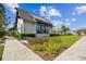 Attractive home exterior with well-maintained landscaping and modern architectural details at 6109 Marsh Trail Dr, Odessa, FL 33556