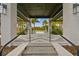 Elegant entrance leading to the community pool with beautiful landscaping at 6109 Marsh Trail Dr, Odessa, FL 33556