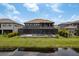 Stunning backyard features a screened-in pool, patio, and well-manicured lawn, perfect for outdoor enjoyment at 6109 Marsh Trail Dr, Odessa, FL 33556