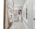 Bathroom featuring decorative tile, window, neutral color palette, and serene artwork at 661 14Th S Ave, St Petersburg, FL 33701