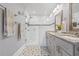 Updated bathroom featuring glass shower, modern vanity, new fixtures and decorative tile floors at 661 14Th S Ave, St Petersburg, FL 33701