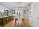 Elegant dining room featuring hardwood floors, stylish furnishings, and natural light at 661 14Th S Ave, St Petersburg, FL 33701
