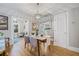 Bright dining room features stylish chandelier, hardwood floors, and decor accents throughout at 661 14Th S Ave, St Petersburg, FL 33701