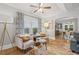 Cozy living room featuring hardwood floors, stylish seating, and an open floor plan at 661 14Th S Ave, St Petersburg, FL 33701