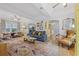 Spacious living room featuring hardwood floors, stylish furnishings, and an open layout at 661 14Th S Ave, St Petersburg, FL 33701