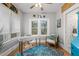 Bright home office boasts natural light, stylish decor, and a serene workspace at 661 14Th S Ave, St Petersburg, FL 33701