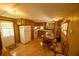 Classic kitchen with wood cabinetry and laminate flooring with table at 7240 Ottley St, Zephyrhills, FL 33541