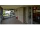 Spacious enclosed porch includes storage cabinets and room to entertain at 7240 Ottley St, Zephyrhills, FL 33541