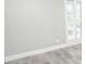Well-lit room with modern shutters and hard wood flooring at 913 Spindle Palm Way, Apollo Beach, FL 33572