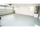 Spacious garage with a modern door and plenty of room for parking and storage at 913 Spindle Palm Way, Apollo Beach, FL 33572
