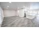Bright and spacious kitchen with white cabinets, stainless steel appliances, and an oversized island at 913 Spindle Palm Way, Apollo Beach, FL 33572