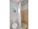 Bathroom featuring toilet and open shower with a tile floor at 963 27Th S Ave, St Petersburg, FL 33705