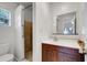 Bathroom with tile flooring, vanity sink, and open shower at 963 27Th S Ave, St Petersburg, FL 33705