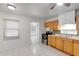 Efficient kitchen layout with stainless steel appliances and ample counter space at 963 27Th S Ave, St Petersburg, FL 33705