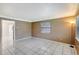 Bright living room featuring tile floors, neutral walls, and ample natural light at 963 27Th S Ave, St Petersburg, FL 33705
