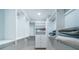 Bright walk-in closet featuring custom shelves, drawers, and ample storage space at 1 Seaside Ln # 302, Belleair, FL 33756