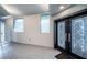Bright entryway shows tiled floors, transom window, and decorative double doors at 1 Seaside Ln # 302, Belleair, FL 33756