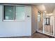 Hallway shows unit 302, gate to entrance, and tiled flooring leading to the front door at 1 Seaside Ln # 302, Belleair, FL 33756