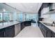 Gourmet kitchen featuring a large island, modern appliances, and stylish finishes at 1 Seaside Ln # 302, Belleair, FL 33756