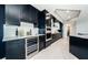 Well-appointed kitchen featuring modern appliances, ample counter space, and sleek design at 1 Seaside Ln # 302, Belleair, FL 33756