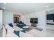 Open-concept living room featuring sleek furniture and an inviting atmosphere at 1 Seaside Ln # 302, Belleair, FL 33756