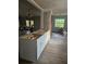 A kitchen renovation with new cabinets and flooring, offering a fresh start to the space at 1011 Mallow Way, Brandon, FL 33510