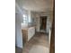 A kitchen renovation is in progress with newly installed cabinets and fixtures at 1011 Mallow Way, Brandon, FL 33510