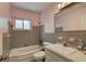 Bathroom featuring classic tiling, bathtub and vanity at 10703 59Th Ave, Seminole, FL 33772