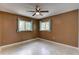 This cozy bedroom features natural light and an overhead ceiling fan at 10703 59Th Ave, Seminole, FL 33772
